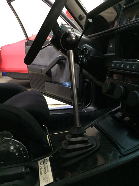 Lancia Delta HF integrale Short Shifter Kit installed with carbon plate